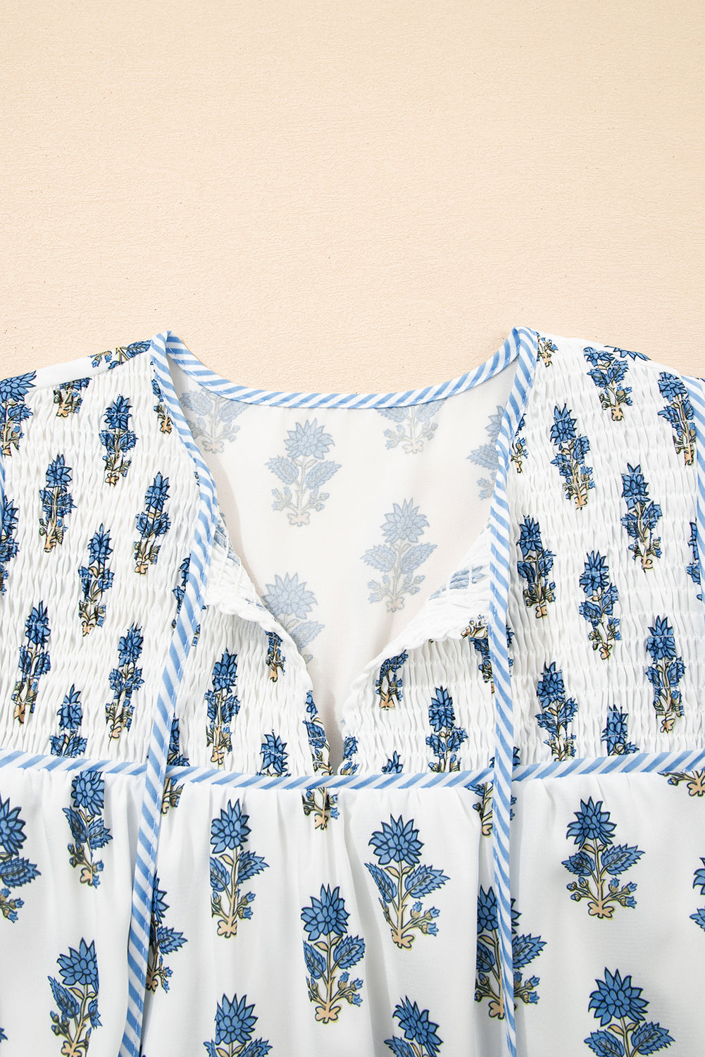 Sky Blue Floral Puff Sleeve Tied Neck Pocketed Mini DressSky Blue Floral Puff Sleeve Tied Neck Pocketed Mini Dress